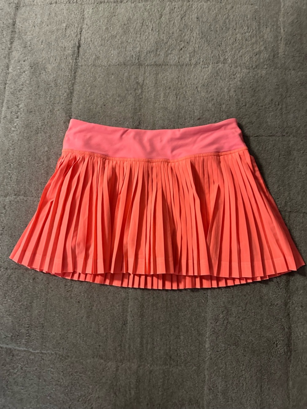 Cute lululemon tennis skirt Sz 4 pink orange salmon color